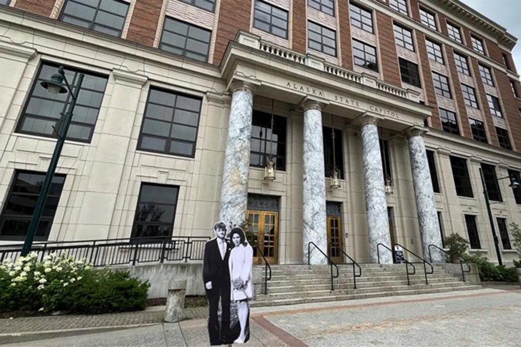 The Chilcutts' wedding photo was placed in front of the Alaska State Capitol