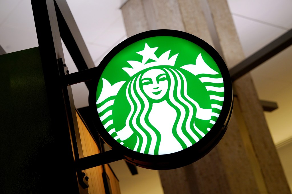 The interior view of a Starbucks shop inside Tampa International Airport, with the prominent green Starbucks logo, photo made on August 2024.