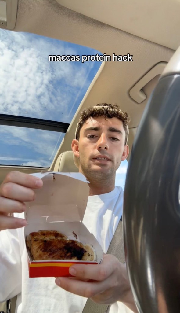Australian Fitness Influencer Jackson Adams eating food in a car while sharing a protein intake