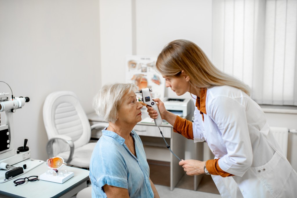 An elderly woman in optometrist.