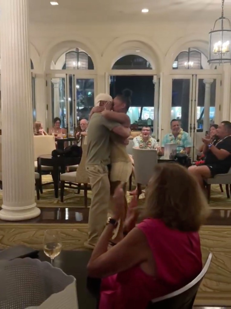 False man-proposals for woman at restaurant to get free drinks, stirring fierce debate