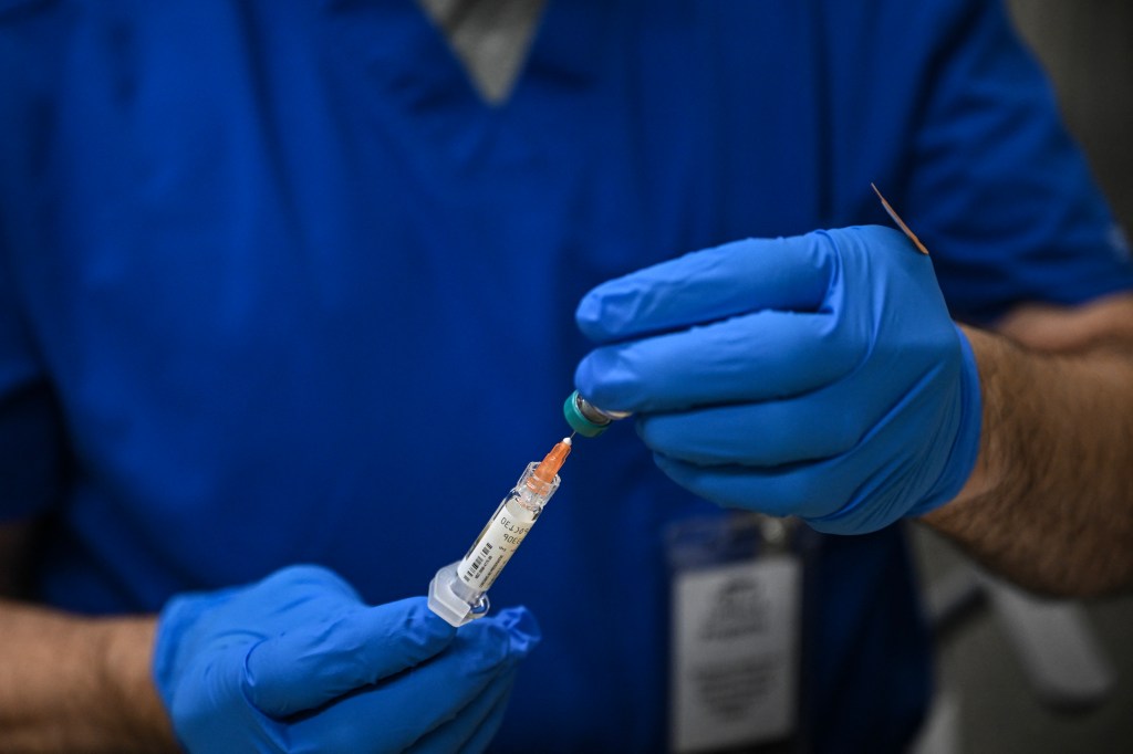 A health worker prepares a dose of measles vaccine at a Lubbock health center, Texas, on February 27, 2025.