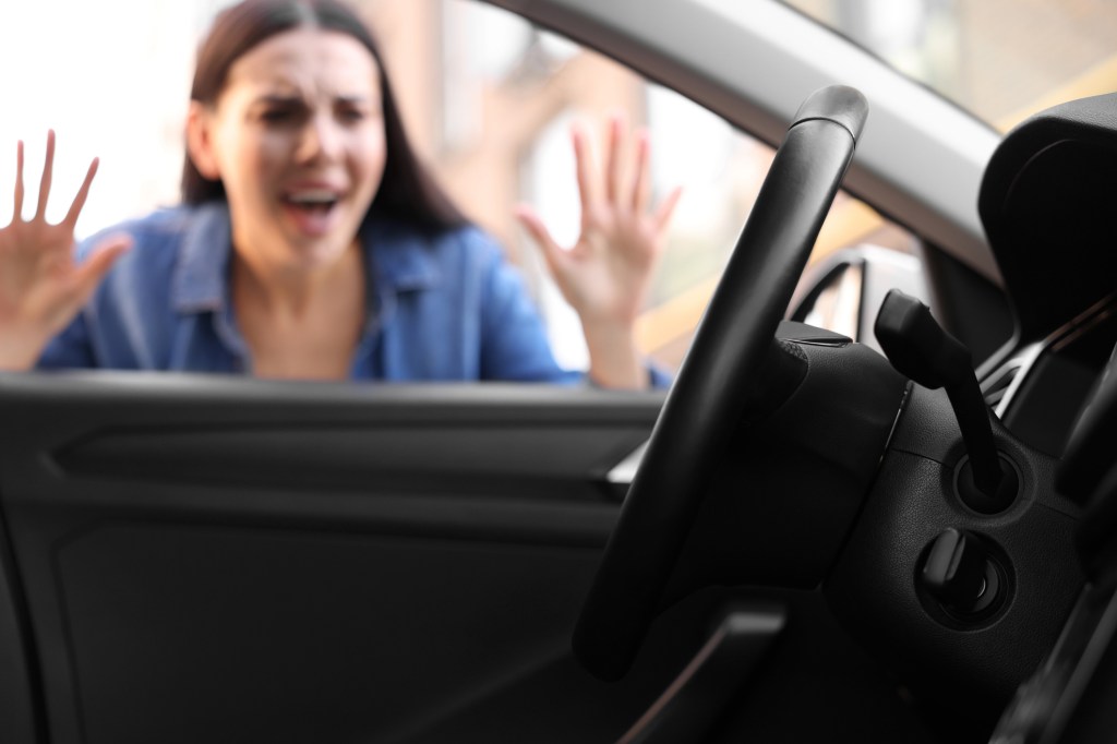 the woman screaming in a car