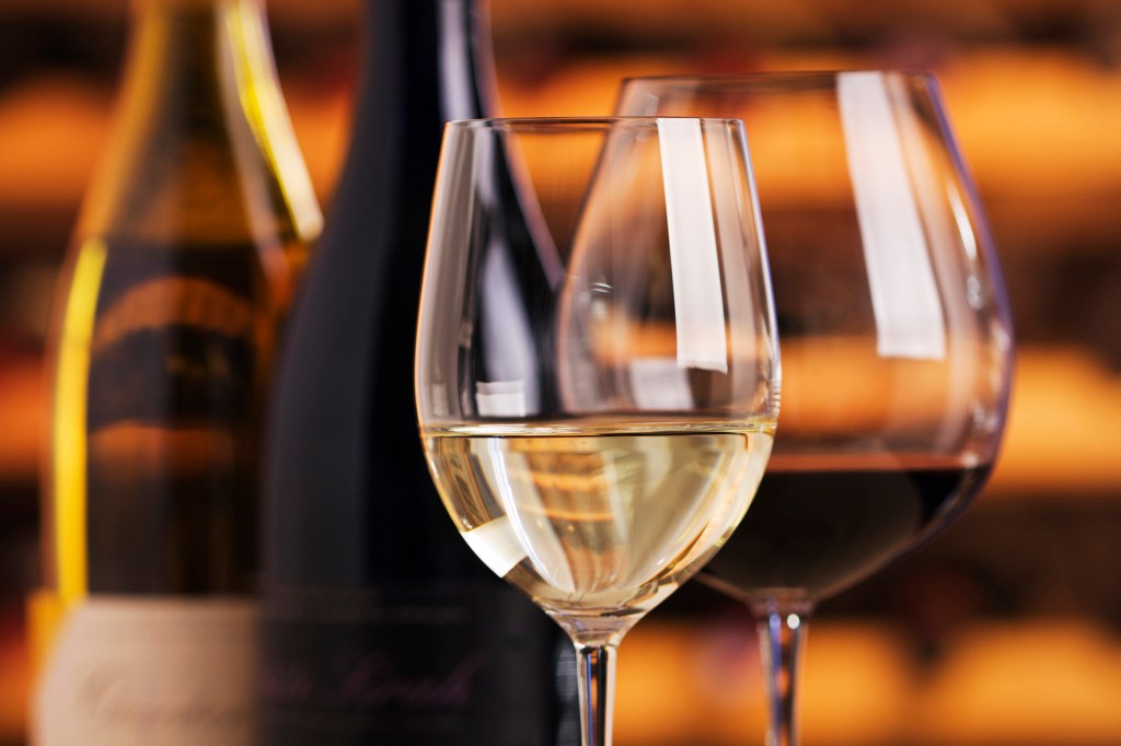 Wine glasses with red wine and white