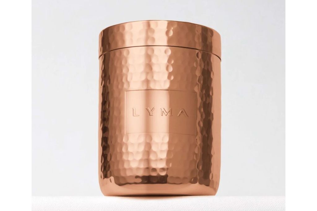 A copper bottle with additions to it