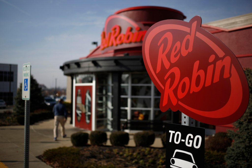 Signs to Red Robin Gourmet Burgers Inc. Show outside the company's restaurant in Louisville, Kentucky, SH.BA, on December 14, 2016