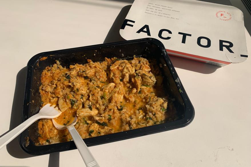 A fork and spoon on a chicken plate